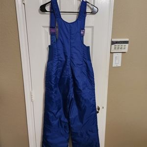 Ossi skiwear pants , size women's small and color blue